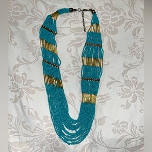 Blue beaded gold statement necklace